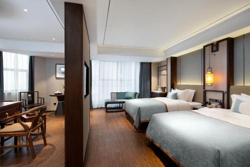 Imagen de la habitación del Hotel Till Bright, Leiyang Zhongxing Times Square. Foto 15
