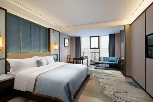 Imagen de la habitación del Hotel Till Bright, Leiyang Zhongxing Times Square. Foto 17