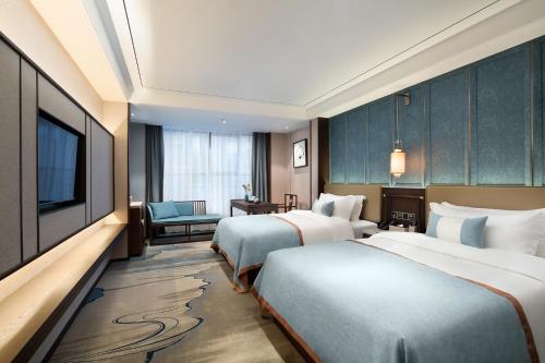Imagen de la habitación del Hotel Till Bright, Leiyang Zhongxing Times Square. Foto 19