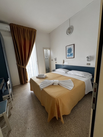 Imagen de la habitación del Hotel Till, Rimini. Foto 8