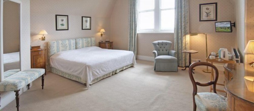 Imagen de la habitación del Hotel Tillmouth Park Country House. Foto 17