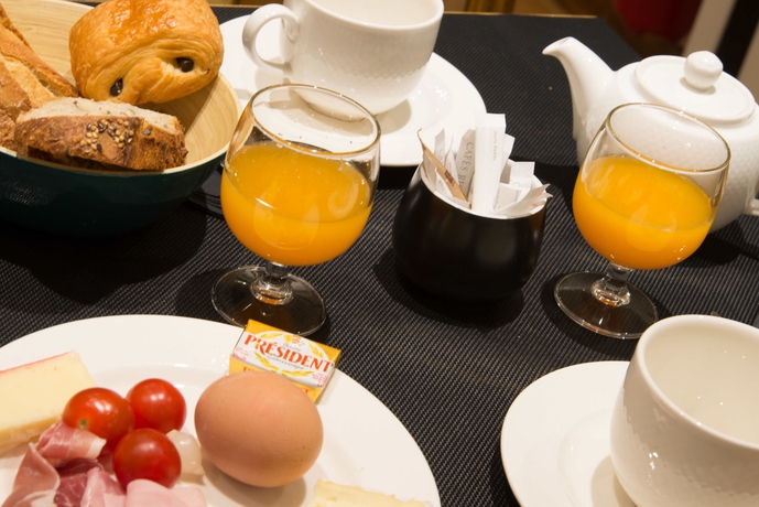 Imagen del bar/restaurante del Hotel Tilsitt Etoile. Foto 4