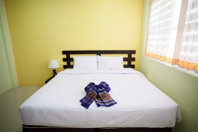 Imagen de la habitación del Hotel Tim Mansion. Foto 5