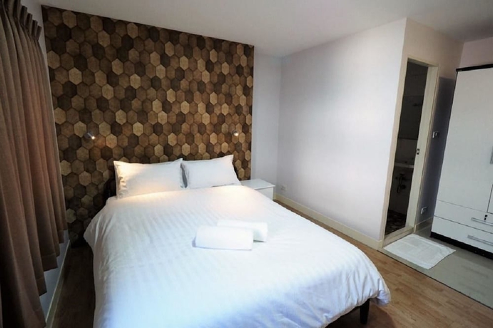 Imagen de la habitación del Hotel Tim Place - Bts Phra Khanong. Foto 4