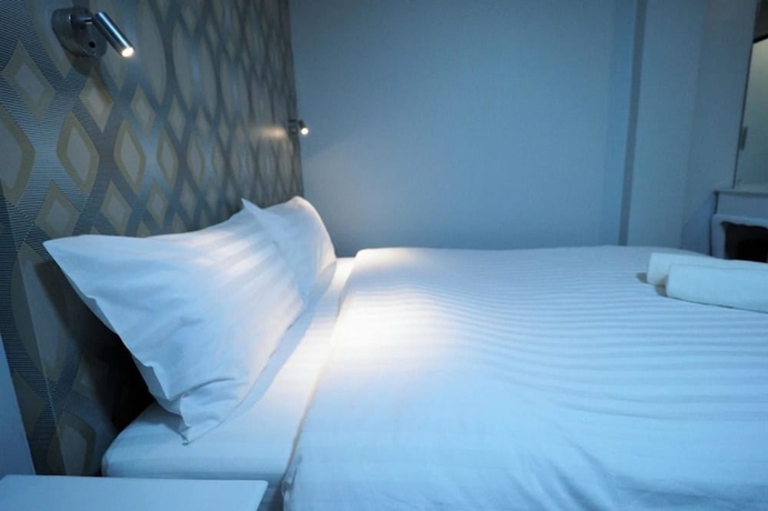 Imagen de la habitación del Hotel Tim Place - Bts Phra Khanong. Foto 6