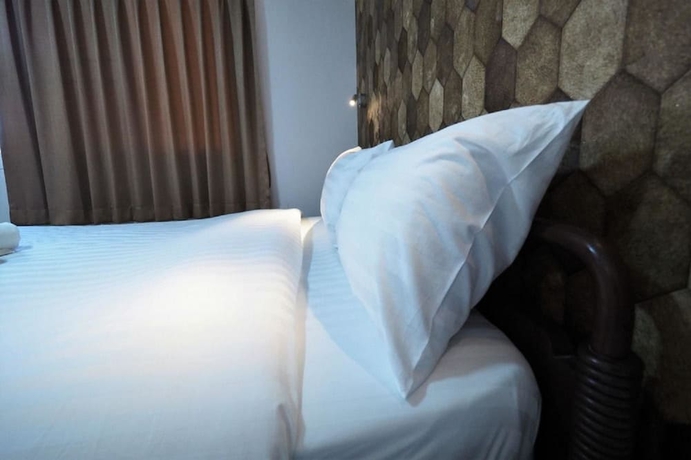 Imagen de la habitación del Hotel Tim Place - Bts Phra Khanong. Foto 7