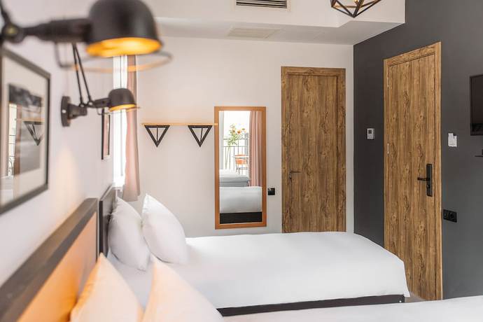 Imagen de la habitación del Hotel Timber Boutique. Foto 7