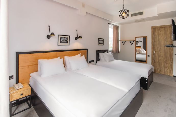 Imagen de la habitación del Hotel Timber Boutique. Foto 8