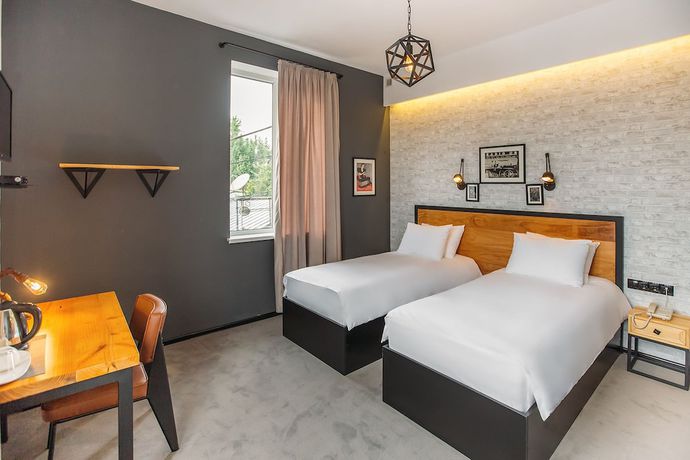 Imagen de la habitación del Hotel Timber Boutique. Foto 9