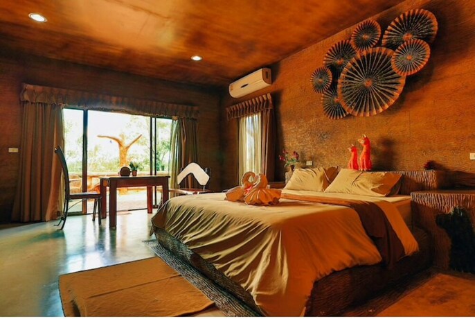 Imagen de la habitación del Hotel Timberland and Fruit Resort. Foto 13