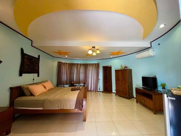 Imagen de la habitación del Hotel Timberland and Fruit Resort. Foto 16