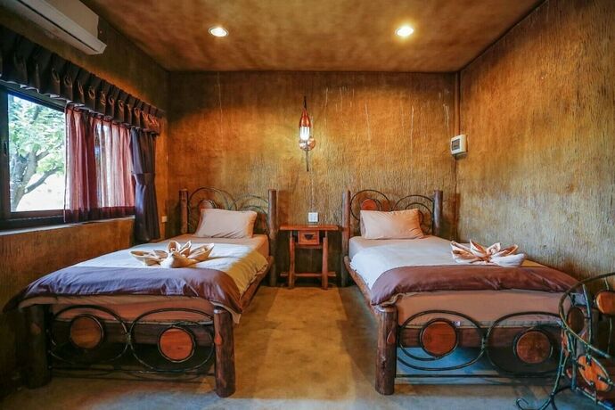 Imagen de la habitación del Hotel Timberland and Fruit Resort. Foto 18