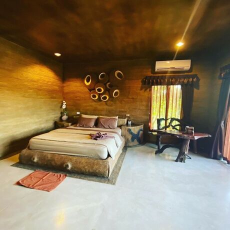 Imagen de la habitación del Hotel Timberland and Fruit Resort. Foto 19