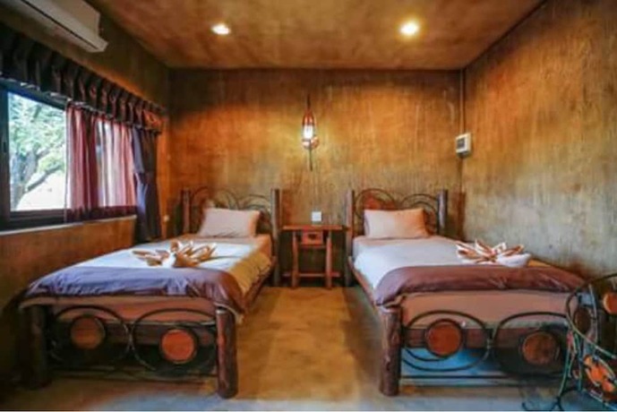 Imagen de la habitación del Hotel Timberland and Fruit Resort. Foto 23