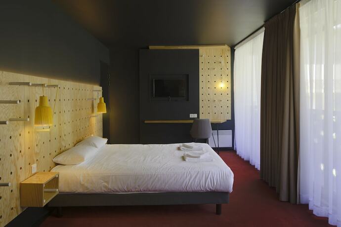 Imagen de la habitación del Hotel Timberlodge. Foto 12