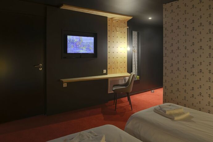 Imagen de la habitación del Hotel Timberlodge. Foto 17