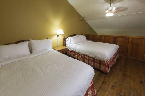 Imagen de la habitación del Hotel Timbers Lodge. Foto 5