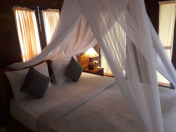 Imagen de la habitación del Hotel Timbool Bungalow. Foto 18