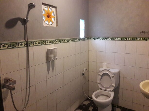 Imagen de la habitación del Hotel Timbool Bungalow. Foto 20