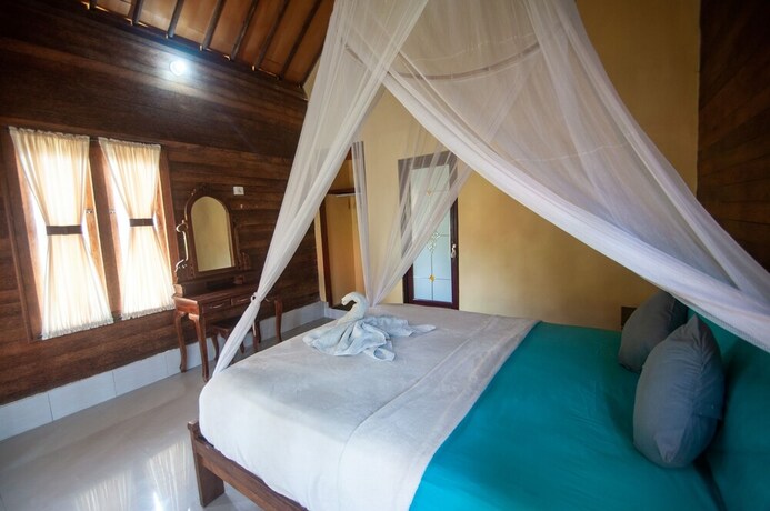 Imagen de la habitación del Hotel Timbool Bungalow. Foto 22