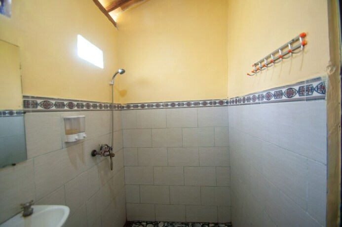 Imagen de la habitación del Hotel Timbool Bungalow. Foto 30