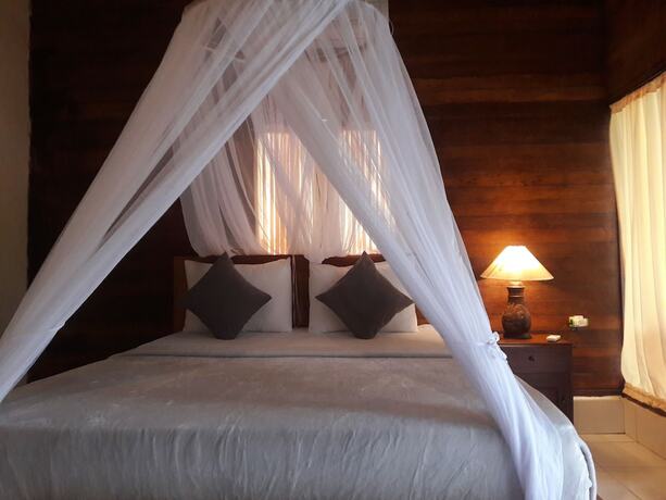 Imagen de la habitación del Hotel Timbool Bungalow. Foto 32