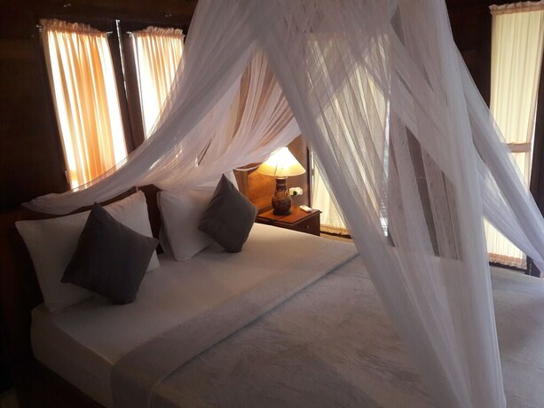 Imagen de la habitación del Hotel Timbool Bungalow. Foto 33