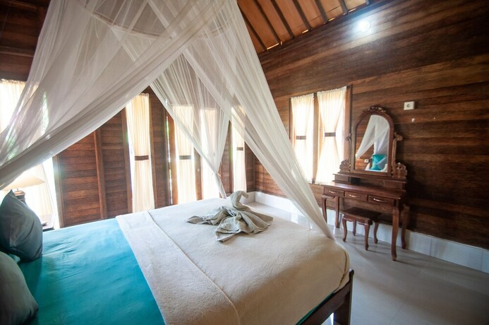 Imagen de la habitación del Hotel Timbool Bungalow. Foto 35
