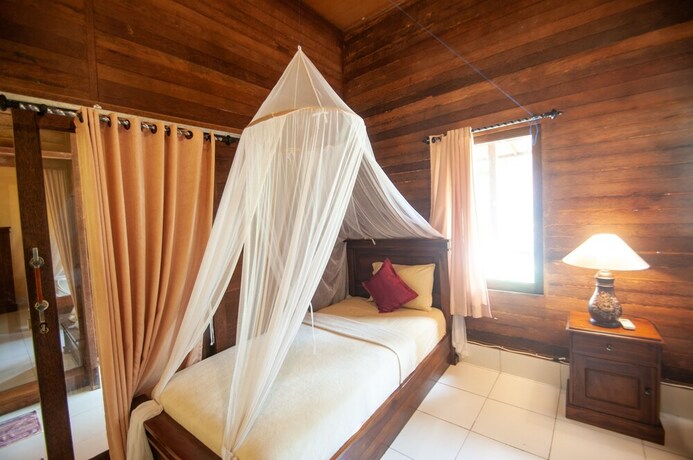Imagen de la habitación del Hotel Timbool Bungalow. Foto 36