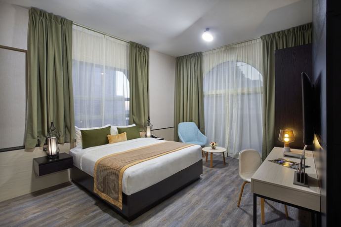 Imagen de la habitación del Hotel Time Express Al Khan. Foto 9