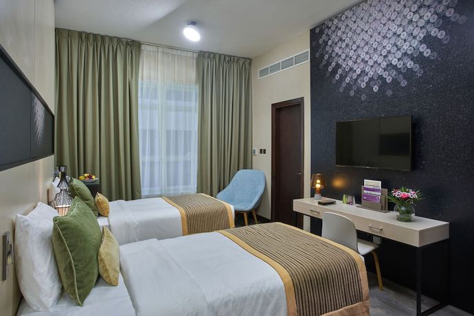 Imagen de la habitación del Hotel Time Express Al Khan. Foto 15