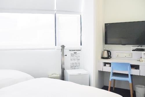 Imagen de la habitación del Hotel Time Flyer. Foto 3