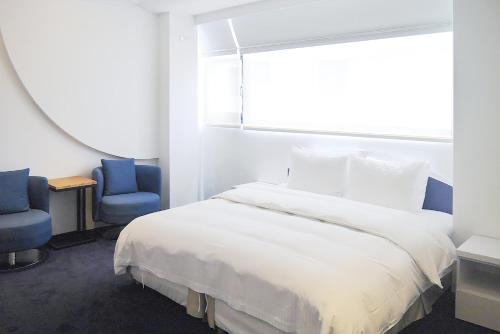 Imagen de la habitación del Hotel Time Flyer. Foto 4