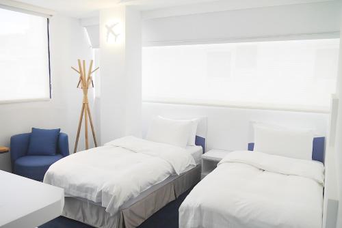 Imagen de la habitación del Hotel Time Flyer. Foto 6