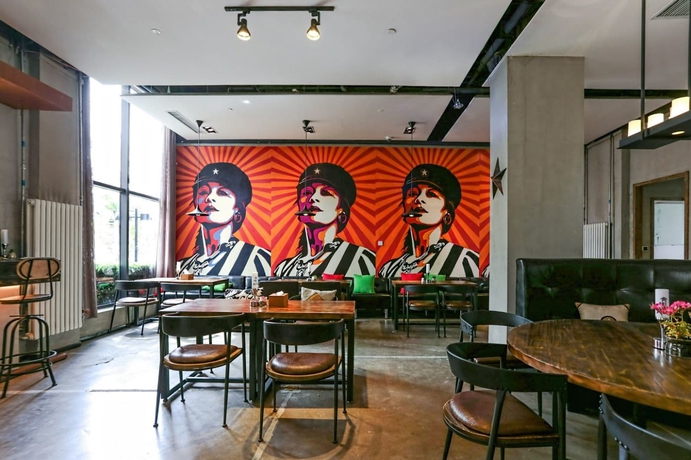 Imagen del bar/restaurante del Hotel Time Tunnel Designer. Foto 7