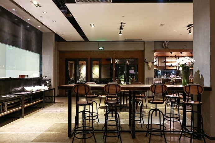 Imagen del bar/restaurante del Hotel Time Tunnel Designer. Foto 8