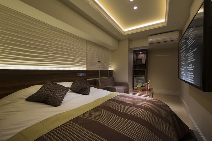 Imagen de la habitación del Hotel Times - Adults Only. Foto 8