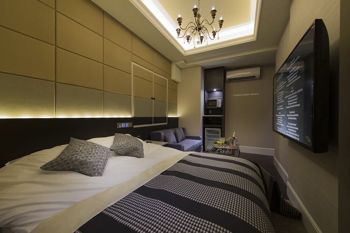 Imagen de la habitación del Hotel Times - Adults Only. Foto 10