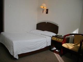 Imagen de la habitación del Hotel Times Holiday Beijing. Foto 1