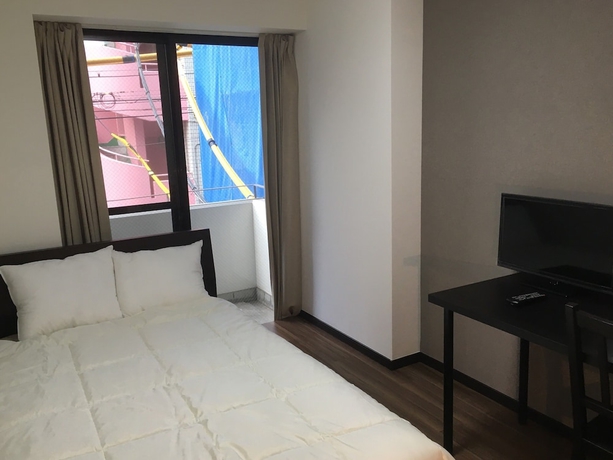 Imagen de la habitación del Hotel Times Inn. Foto 9