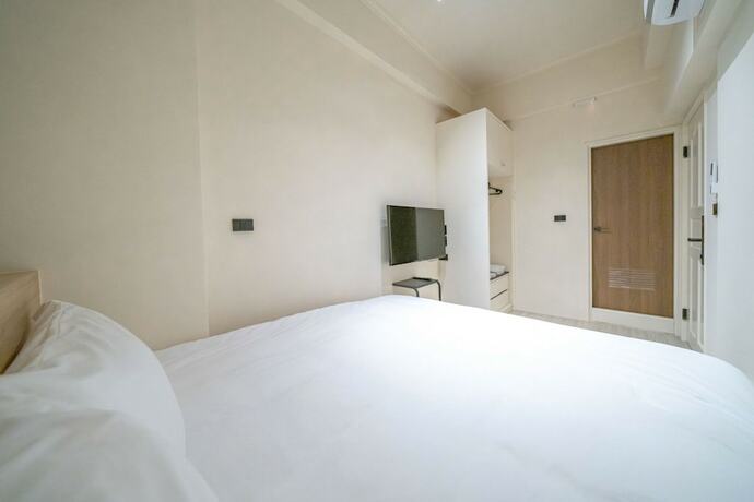 Imagen de la habitación del Hotel Times Inn - Tainan. Foto 18