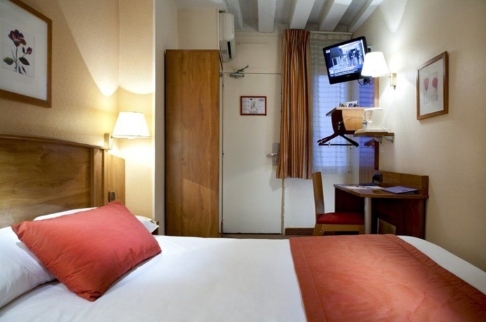 Imagen de la habitación del Hotel Timhotel Le Louvre. Foto 5