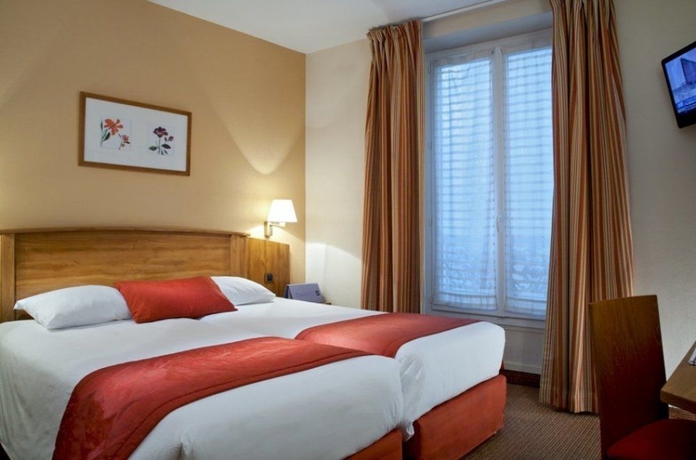 Imagen de la habitación del Hotel Timhotel Le Louvre. Foto 6