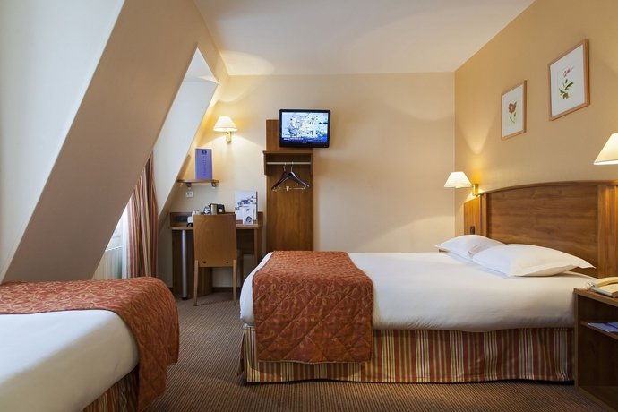 Imagen de la habitación del Hotel Timhotel Montmartre. Foto 2