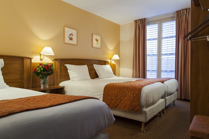 Imagen de la habitación del Hotel Timhotel Montmartre. Foto 6