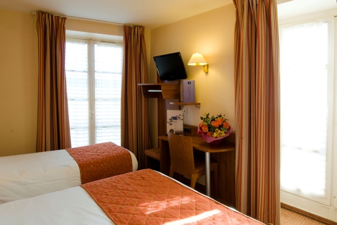 Imagen de la habitación del Hotel Timhotel Montmartre. Foto 8