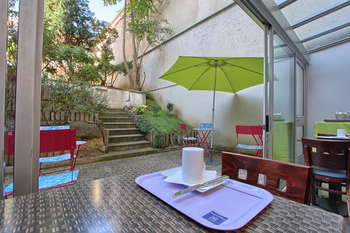 Imagen del bar/restaurante del Hotel Timhotel Nation. Foto 3