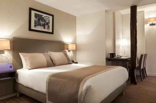 Imagen de la habitación del Hotel Timhotel Opéra Madeleine. Foto 2