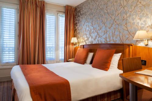 Imagen de la habitación del Hotel Timhotel Opéra Madeleine. Foto 3