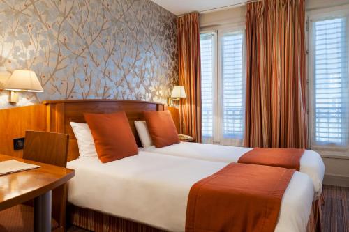 Imagen de la habitación del Hotel Timhotel Opéra Madeleine. Foto 4